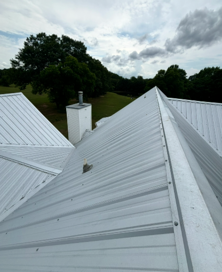 Standing seam metal roof installed by CW2 Renovations
