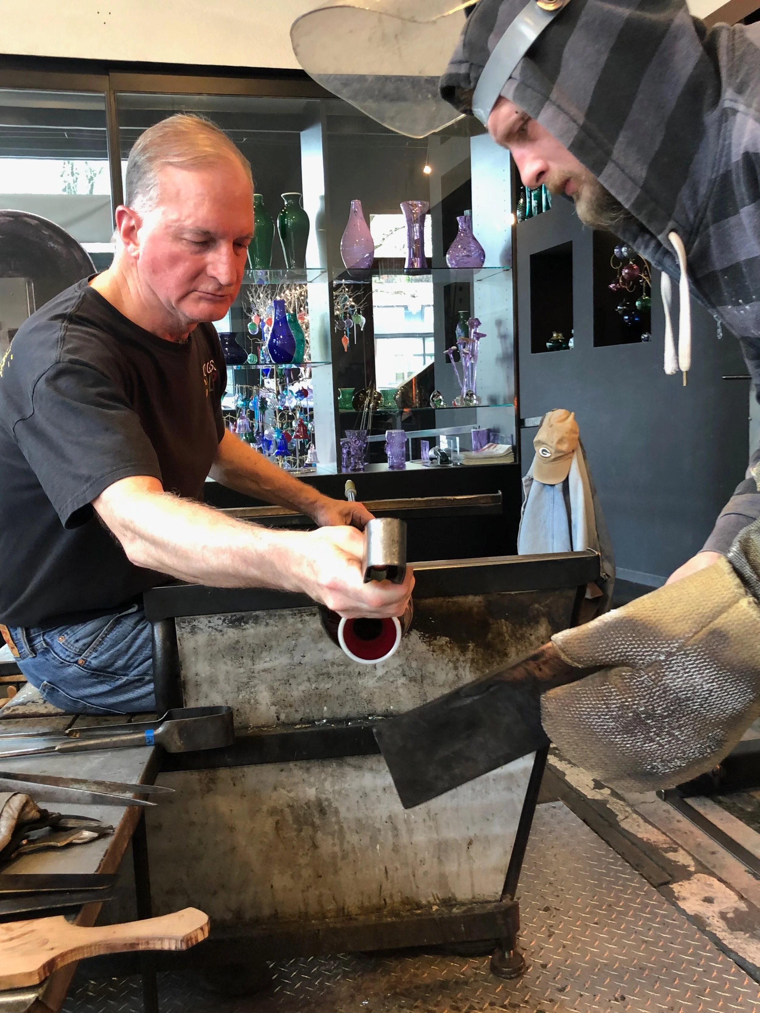 Andrew Lueck creating a cup with Greg Lueck