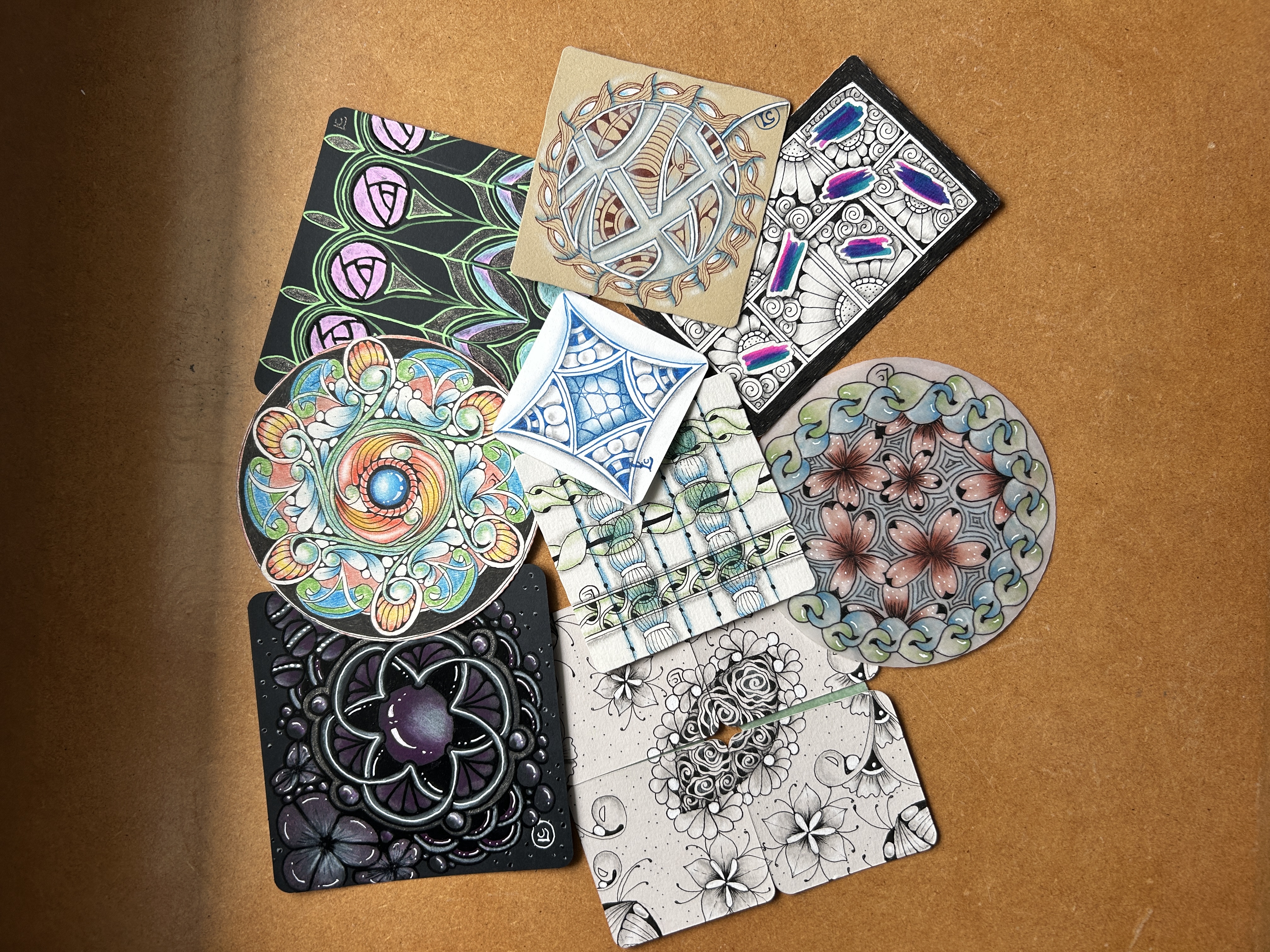 A selection of tiles created by Lisa Crow at the Zenjo Retreat 2025 in Glasgow
