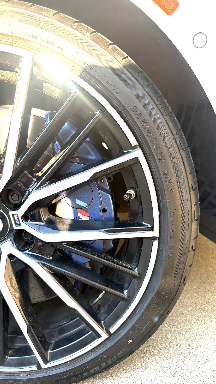 Refinished BMW alloy wheel with machined face, curb rash removed, San Marcos CA