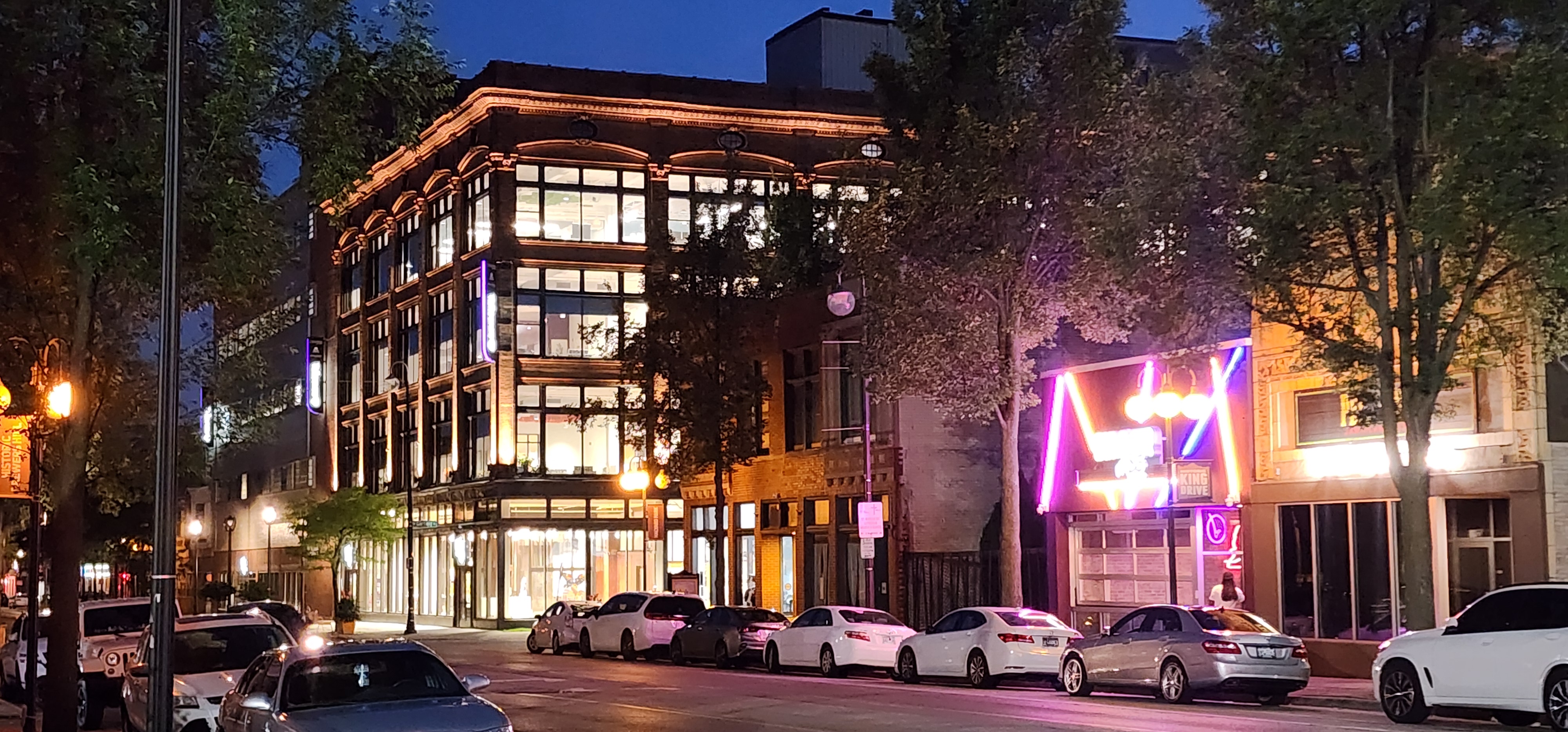 Revitalized historic commercial corridor at golden hour