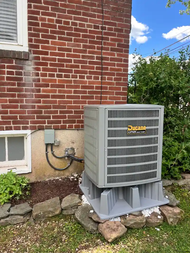 Central air conditioning condenser unit installed by JB Plumbing HVAC and Construction in Reading, PA