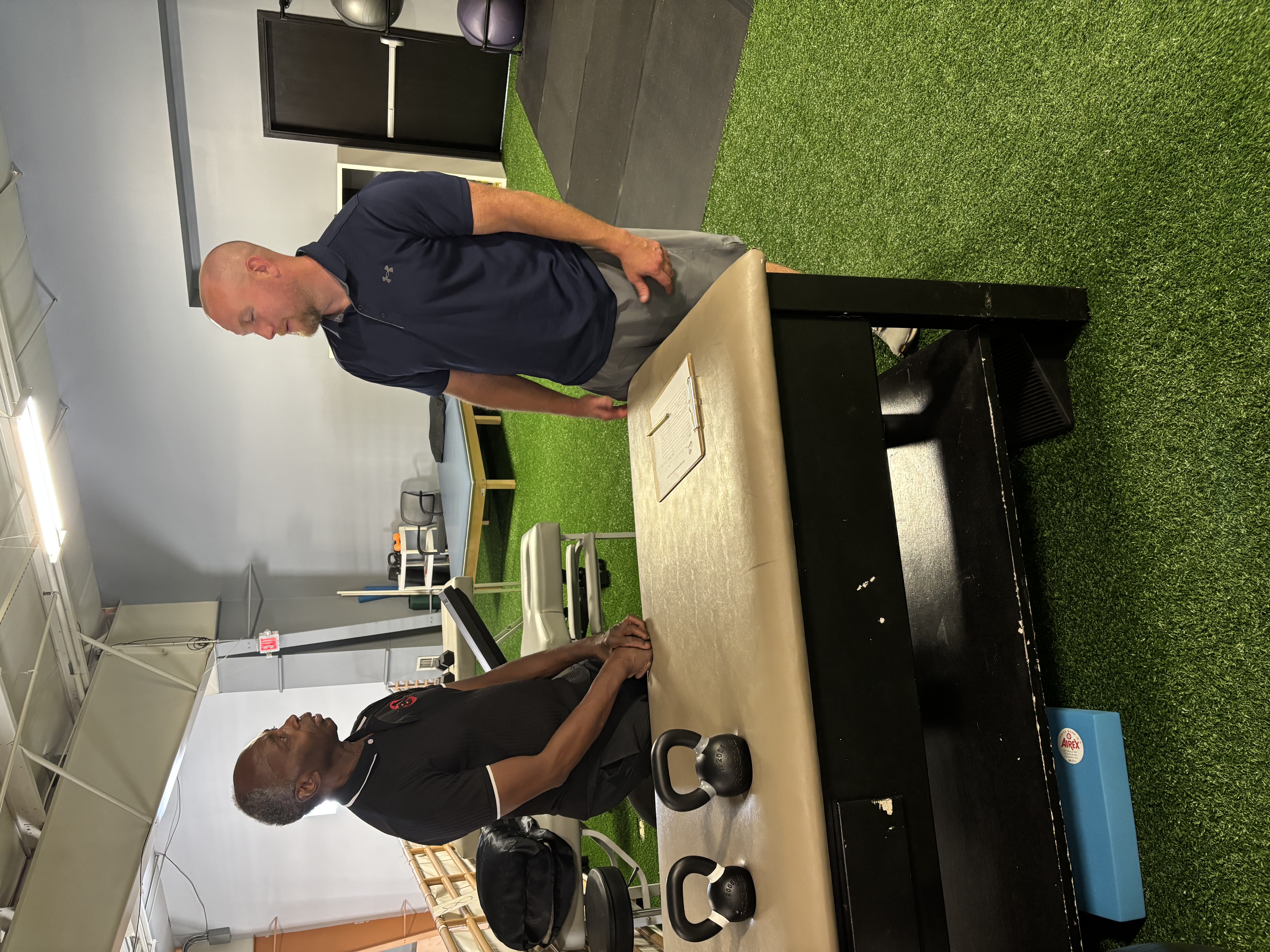 Cody Wickenhauser working one on one with a client at Free to Move