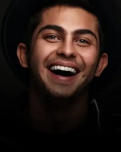 Young man with a wide, straight smile, clear aligner treatment in Chafford Hundred