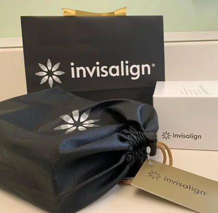 Invisalign branded gift bag and aligner pouch given to patients