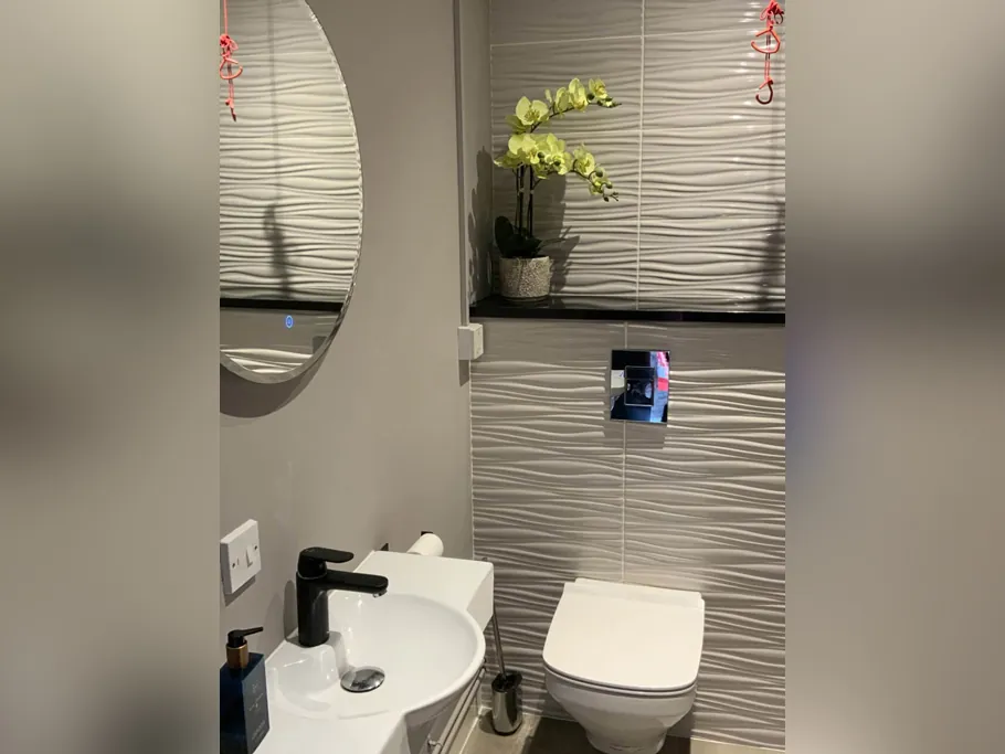 Clean, modern patient washroom at the practice