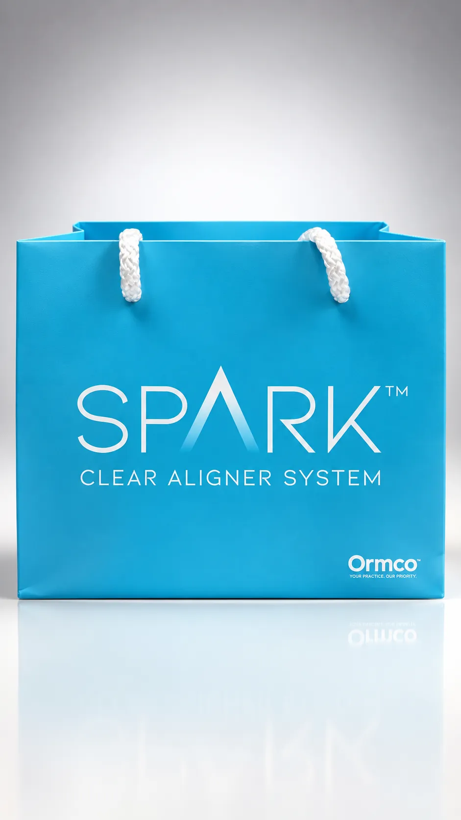 Blue Spark Clear Aligner System gift bag with rope handles