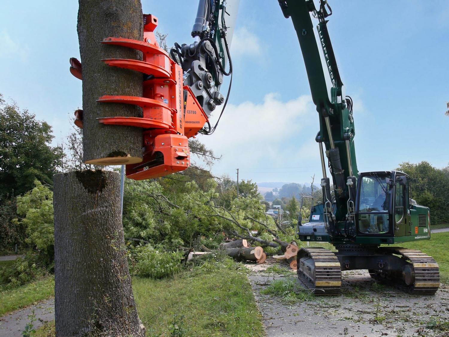 Field and Forest grapple saw in use