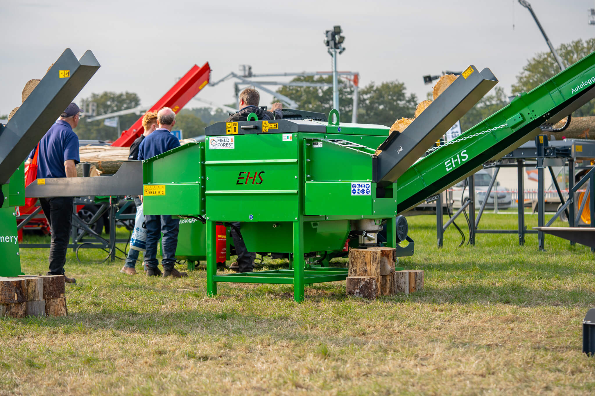 Firewood processing machinery in use