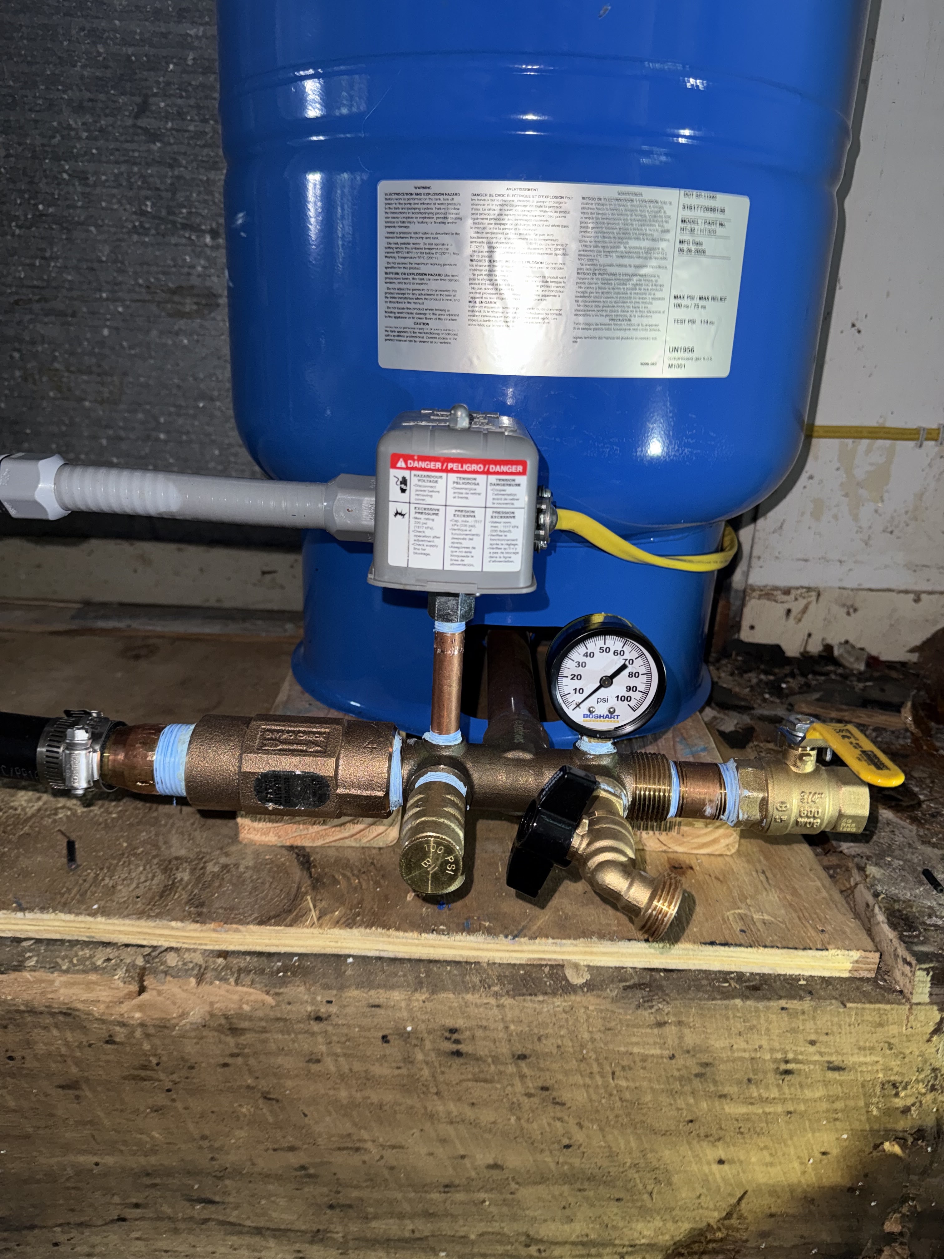 Finished pressure tank and T-package installation with clean new pipework